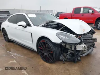 2018 Porsche Panamera with VIN WP0AA2A74JL115600, listed as a IAAI auction lot 41922207 with 125,786 mi miles and . Bid and sale history available at DreamBid. Image 1.