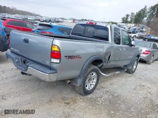 2002 Toyota Tundra SR5 with VIN 5TBRT34132S303771, listed as a IAAI auction lot 41633862 with 162,395 mi miles. Bid and sale history available at carsss.com. Image 4.