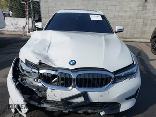 2021 BMW 3 Series 330e with VIN 3MW5P7J00M8C21180, listed as a IAAI auction lot 41451850 with 70,459 mi miles. Bid and sale history available at carsss.com. Image 12.