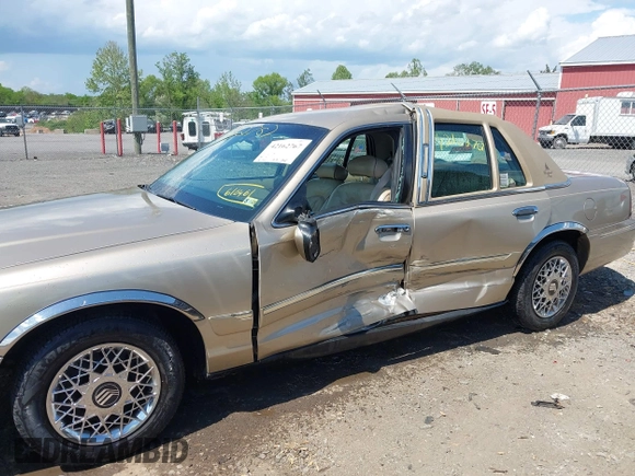 2000 Mercury Grand Marquis GS z VIN 2MEFM74W3YX610461, wystawiony jako IAAI lot #42162767 z przebiegiem 181 400 mil mil oraz . Historia ofert i sprzedaży dostępna na DreamBid. Obrazek 6.