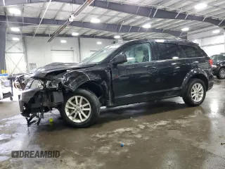 2014 Dodge Journey SXT z VIN 3C4PDDBG1ET271213, wystawiony jako Copart lot #57513185 z przebiegiem 147 948 mil mil oraz Szkoda całkowita • Salvage title. Historia ofert i sprzedaży dostępna na DreamBid. Obrazek 1.
