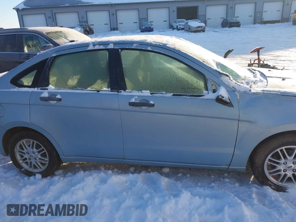 2009 Ford Focus SE z VIN 1FAHP35N79W262568, wystawiony jako IAAI lot #41288346 z przebiegiem 138 902 mil mil oraz . Historia ofert i sprzedaży dostępna na DreamBid. Obrazek 13.