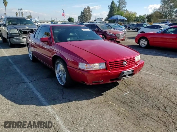 1999 Cadillac Eldorado Touring z VIN 1G6ET1293XU611368, wystawiony jako Copart lot #82683114 z przebiegiem 126 178 mil mil oraz Szkody całkowita. Historia ofert i sprzedaży dostępna na DreamBid. Obrazek 10.