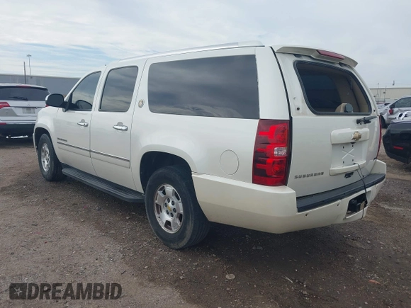 2010 Chevrolet Suburban LTZ with VIN 1GNUCKE03AR248244, listed as a IAAI auction lot 41677238 with 184,698 mi miles. Bid and sale history available at carsss.com. Image 3.