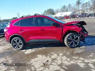 2021 Ford Escape SE Hybrid with VIN 1FMCU9BZ2MUB13234, listed as a IAAI auction lot 41271112 with 49,663 mi miles and . Bid and sale history available at DreamBid. Image 13.