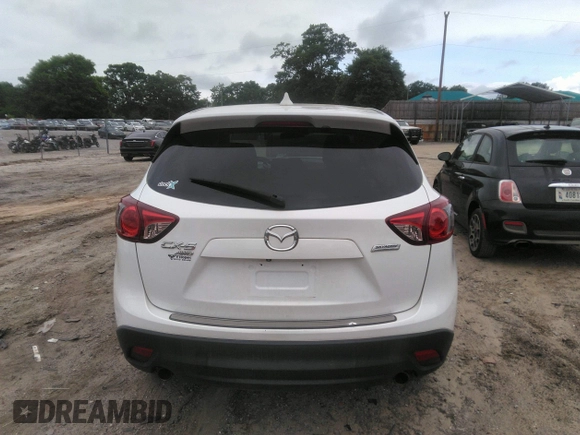 2014 Mazda CX-5 Touring z VIN JM3KE4CY0E0303748, wystawiony jako IAAI lot #42127406 z przebiegiem Nie podano mil oraz . Historia ofert i sprzedaży dostępna na DreamBid. Obrazek 15.