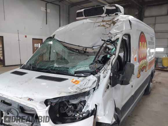 2020 Ford Transit Cargo z VIN 1FTBR2C81LKA68599, wystawiony jako IAAI lot #41381157 z przebiegiem 63 382 mil mil oraz . Historia ofert i sprzedaży dostępna na DreamBid. Obrazek 6.