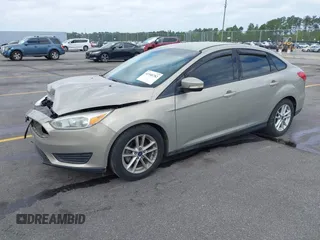 2016 Ford Focus SE with VIN 1FADP3F23GL350387, listed as a IAAI auction lot 41948782 with 70,188 mi miles. Bid and sale history available at carsss.com. Image 2.