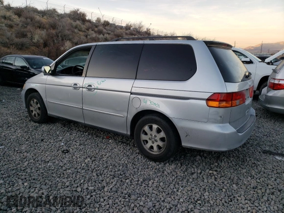 2003 Honda Odyssey EX-L with VIN 5FNRL18773B108692, listed as a Copart auction lot 88918365 with Not provided miles and Salvage title. Bid and sale history available at DreamBid. Image 2.