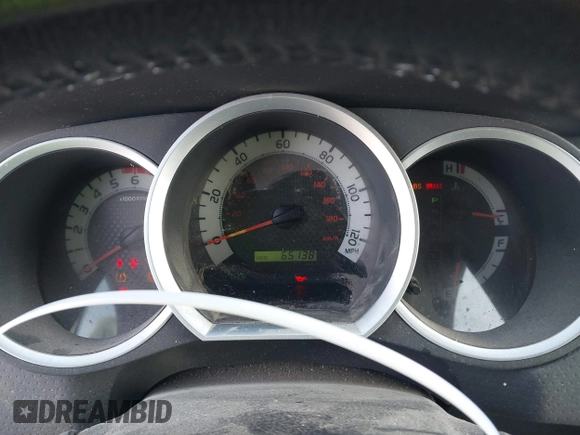 2014 Toyota Tacoma PreRunner with VIN 3TMJU4GN1EM156845, listed as a IAAI auction lot 40972570 with 65,138 mi miles. Bid and sale history available at carsss.com. Image 7.