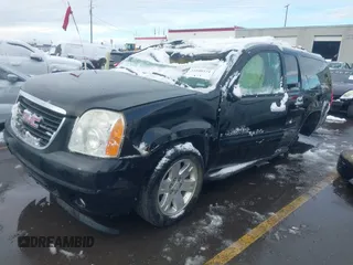 2007 GMC Yukon XL SLT with VIN 1GKFK16377R377124, listed as a IAAI auction lot 41808174 with 217,584 mi miles. Bid and sale history available at carsss.com. Image 2.