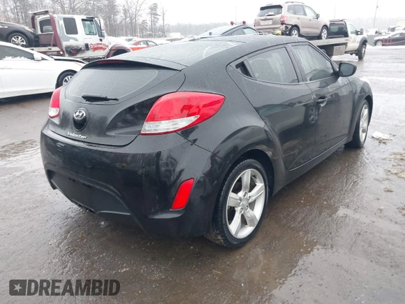 2012 Hyundai Veloster w/Black Int with VIN KMHTC6ADXCU024923, listed as a IAAI auction lot 41556793 with 101,923 mi miles and . Bid and sale history available at DreamBid. Image 4.