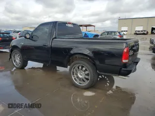 2000 Ford F-150 XL with VIN 1FTZF1725YNB93067, listed as a Copart auction lot 86750464 with Not provided miles and Salvage title. Bid and sale history available at DreamBid. Image 2.