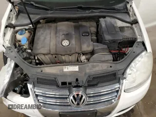 2010 Volkswagen Jetta S with VIN 3VWJZ7AJ5AM004163, listed as a Copart auction lot 54312695 with 148,160 mi miles and Salvage title. Bid and sale history available at DreamBid. Image 11.
