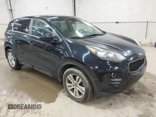 2018 Kia Sportage LX z VIN KNDPMCAC9J7351060, wystawiony jako IAAI lot #42011814 z przebiegiem 174 504 mil mil oraz . Historia ofert i sprzedaży dostępna na DreamBid. Obrazek 1.