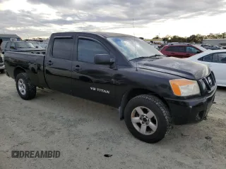 2008 Nissan Titan with VIN 1N6BA07F88N309789, listed as a Copart auction lot 77879284 with 213,835 mi miles and Salvage title. Bid and sale history available at DreamBid. Image 4.