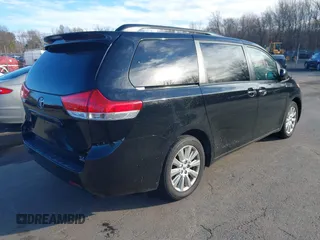 2013 Toyota Sienna XLE with VIN 5TDDK3DC0DS067993, listed as a IAAI auction lot 41832594 with 159,364 mi miles and . Bid and sale history available at DreamBid. Image 4.