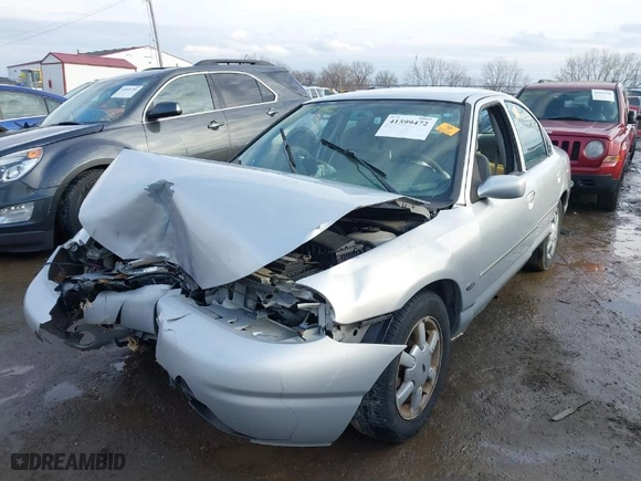 1998 Ford Contour SE with VIN 1FAFP6631WK310154, listed as a IAAI auction lot 41599472 with 133,371 mi miles. Bid and sale history available at carsss.com. Image 2.