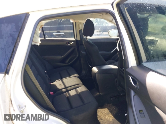 2014 Mazda CX-5 Touring with VIN JM3KE2CY5E0329783, listed as a IAAI auction lot 42017473 with 121,175 mi miles. Bid and sale history available at carsss.com. Image 8.