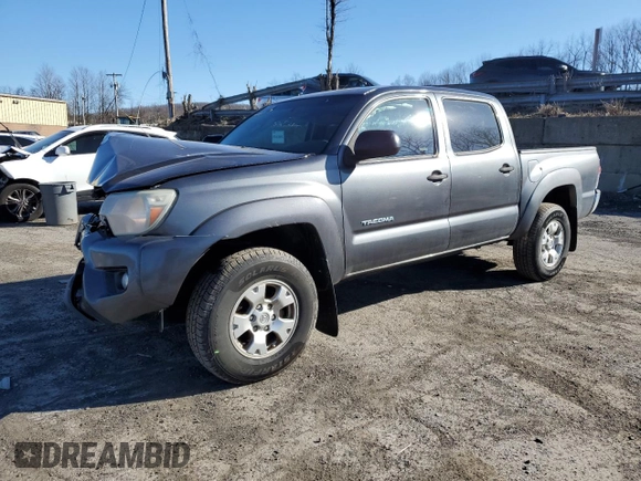 2015 Toyota Tacoma with VIN 3TMLU4EN7FM164526, listed as a Copart auction lot 50977395 with 124,222 mi miles and Salvage Title. Bid and sale history available at carsss.com. Image 1.