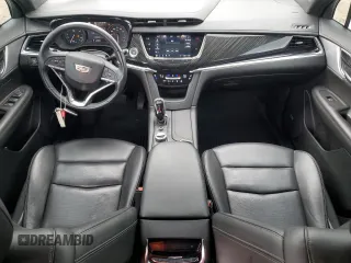2021 Cadillac XT6 Premium Luxury with VIN 1GYKPCRSXMZ169206, listed as a Copart auction lot 55953525 with 64,789 mi miles and Salvage Title. Bid and sale history available at DreamBid. Image 8.