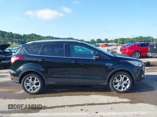2016 Ford Escape Titanium with VIN 1FMCU9J97GUC21242, listed as a IAAI auction lot 42431567 with 96,946 mi miles and . Bid and sale history available at DreamBid. Image 13.