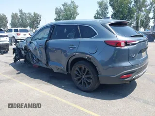 2022 Mazda CX-9 Grand Touring with VIN JM3TCBDY1N0611766, listed as a IAAI auction lot 42452059 with 60,755 mi miles and . Bid and sale history available at DreamBid. Image 3.