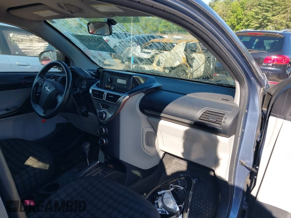 2012 Scion iQ with VIN JTNJJXB05CJ021301, listed as a IAAI auction lot 42323450 with 97,185 mi miles and . Bid and sale history available at DreamBid. Image 5.