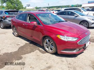 2018 Ford Fusion SE z VIN 3FA6P0HDXJR149729, wystawiony jako IAAI lot #42431325 z przebiegiem 91 250 mil mil oraz . Historia ofert i sprzedaży dostępna na DreamBid. Obrazek 1.