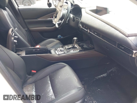 2021 Mazda CX-30 Premium with VIN 3MVDMBDL0MM307045, listed as a IAAI auction lot 42446494 with 33,112 mi miles and . Bid and sale history available at DreamBid. Image 5.