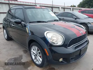 2014 MINI Countryman S with VIN WMWZC3C58EWT01074, listed as a IAAI auction lot 42238095 with 83,252 mi miles and . Bid and sale history available at DreamBid. Image 1.