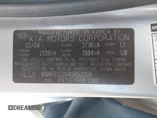 2004 Kia Spectra LX with VIN KNAFE122645052206, listed as a IAAI auction lot 41767864 with 63,866 mi miles. Bid and sale history available at carsss.com. Image 9.