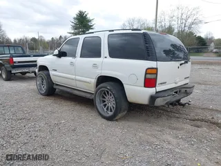 2003 Chevrolet Tahoe LS with VIN 1GNEC13Z73R126800, listed as a IAAI auction lot 41848636 with 267,234 mi miles. Bid and sale history available at carsss.com. Image 3.