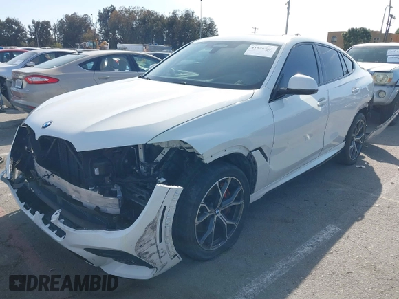 2022 BMW X6 M50i z VIN 5UXCY8C01N9J14882, wystawiony jako IAAI lot #41856966 z przebiegiem 22 893 mil mil oraz . Historia ofert i sprzedaży dostępna na DreamBid. Obrazek 19.