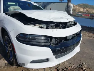 2019 Dodge Charger SXT with VIN 2C3CDXJGXKH533322, listed as a IAAI auction lot 41808838 with 95,877 mi miles and . Bid and sale history available at DreamBid. Image 18.