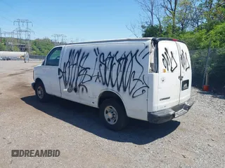 2007 Chevrolet Express Cargo Van with VIN 1GCGG25V471112976, listed as a IAAI auction lot 42130661 with 256,004 mi miles. Bid and sale history available at carsss.com. Image 3.
