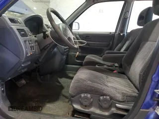 2001 Honda CR-V LX z VIN JHLRD18401C034127, wystawiony jako Copart lot #56577855 z przebiegiem 186 441 mil mil oraz Szkoda całkowita • Salvage title. Historia ofert i sprzedaży dostępna na DreamBid. Obrazek 7.