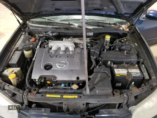 2002 Nissan Maxima GXE z VIN JN1DA31D82T429859, wystawiony jako Copart lot #67025674 z przebiegiem 153 180 mil mil oraz Szkoda całkowita • Salvage title. Historia ofert i sprzedaży dostępna na DreamBid. Obrazek 11.