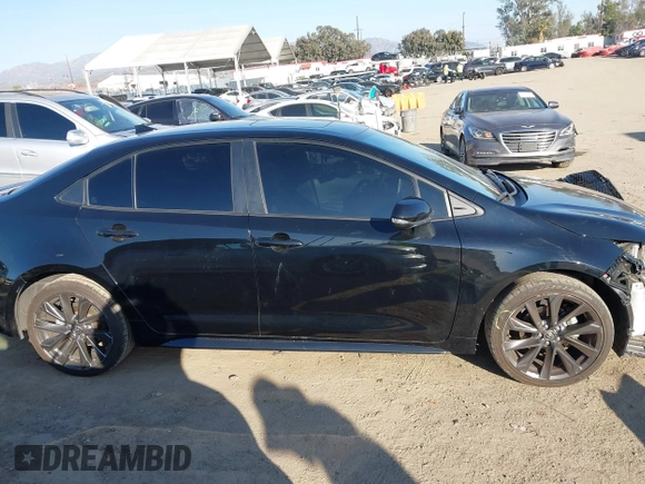 2023 Toyota Corolla Hybrid LE with VIN JTDBCMFE4P3015622, listed as a IAAI auction lot 41644340 with 66,099 mi miles. Bid and sale history available at carsss.com. Image 14.