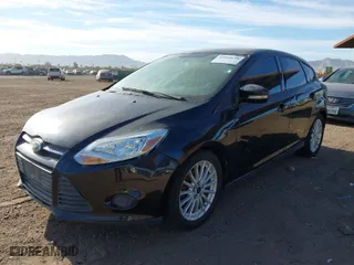 2014 Ford Focus SE with VIN 1FADP3K28EL326167, listed as a IAAI auction lot 41660698 with 97,166 mi miles. Bid and sale history available at carsss.com. Image 2.