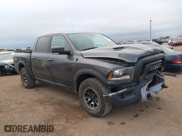 2017 Ram 1500 Rebel z VIN 1C6RR7YT0HS534465, wystawiony jako IAAI lot #41240431 z przebiegiem 125 886 mil mil oraz . Historia ofert i sprzedaży dostępna na DreamBid. Obrazek 13.