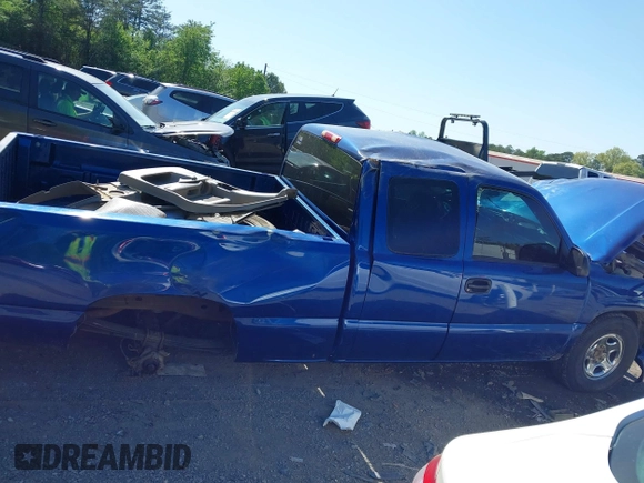 2003 GMC Sierra 1500 SLE z VIN 2GTEC19T131361262, wystawiony jako IAAI lot #41994769 z przebiegiem Nie podano mil oraz . Historia ofert i sprzedaży dostępna na DreamBid. Obrazek 12.