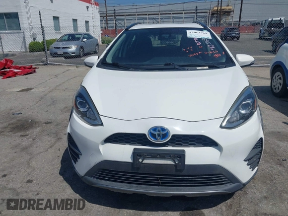 2018 Toyota Prius One with VIN JTDKDTB33J1613019, listed as a IAAI auction lot 42063768 with 59,143 mi miles and . Bid and sale history available at DreamBid. Image 12.