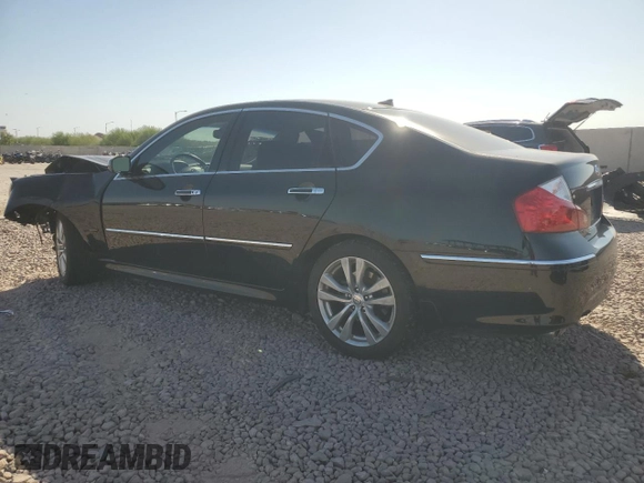 2009 Infiniti M with VIN JNKCY01E09M800754, listed as a Copart auction lot 74478854 with 67,794 mi miles and Salvage Title. Bid and sale history available at DreamBid. Image 2.