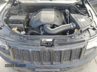 2014 Jeep Grand Cherokee Overland with VIN 1C4RJFCT2EC106002, listed as a Copart auction lot 48763675 with 143,011 mi miles and Salvage Title. Bid and sale history available at DreamBid. Image 12.