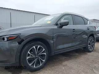 2023 Mazda CX-5 2.5 S Premium Plus Package with VIN JM3KFBEM2P0163054, listed as a IAAI auction lot 41642461 with 18,508 mi miles. Bid and sale history available at carsss.com. Image 6.