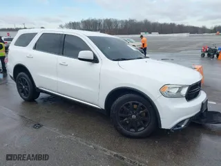 2015 Dodge Durango Special Service with VIN 1C4RDJFG9FC101860, listed as a IAAI auction lot 41144079 with 85,671 mi miles. Bid and sale history available at carsss.com. Image 1.