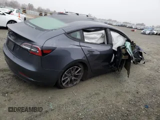 2023 Tesla Model 3 with VIN 5YJ3E1EA4PF426968, listed as a Copart auction lot 85933574 with Not Provided miles and Salvage Title. Bid and sale history available at DreamBid. Image 3.