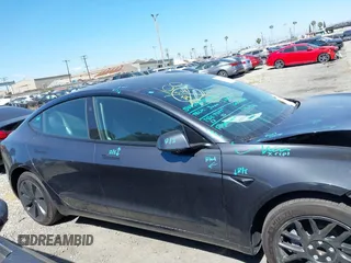2025 Tesla Model 3 Long Range with VIN 5YJ3E1EA1SF884167, listed as a IAAI auction lot 41976320 with 3,146 mi miles and . Bid and sale history available at DreamBid. Image 13.