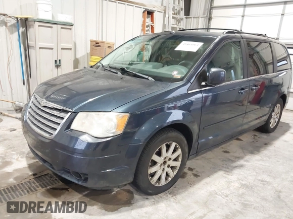2008 Chrysler Town & Country Touring with VIN 2A8HR54P38R684386, listed as a IAAI auction lot 41463061 with 140,392 mi miles. Bid and sale history available at carsss.com. Image 2.